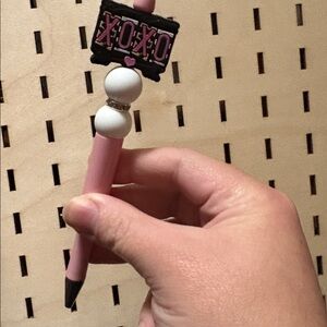 Handcrafted xoxo banner beaded pen